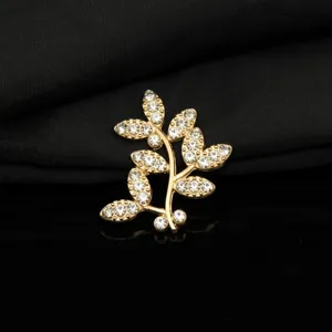 Dettaglio accessorio per gioielli in lega con foglia di albero strass oro, ideale per fai da te.