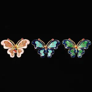 Detailed view of exquisite DIY butterfly enamel alloy accessories for antique hairpins and crafts.