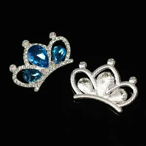 Close-up detail shot of silver crown alloy DIY hair accessory with blue rhinestones.