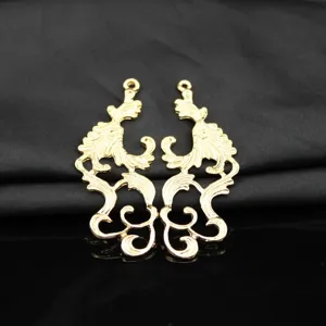 Gold hollow out vintage scroll alloy accessory detail view DIY craft pendant material closeup view
