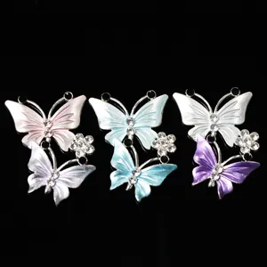 Painted rhinestone butterfly DIY charms for phone cases, shoe accessories, and crafts.