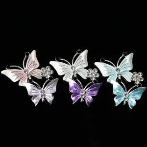 Butterfly DIY rhinestone charms, detailed view of colorful enamel butterfly accessories.