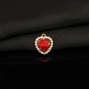 Red rhinestone heart pendant alloy charm for DIY necklaces, bracelets and jewelry making accessories.