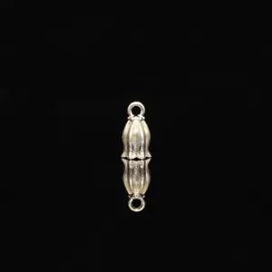 Silver lily of the valley bell flower bud charm pendant for DIY bridal hair accessories.