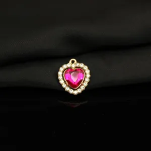 Detailed view of pink heart crystal pendant with rhinestones alloy charm for necklace bracelet.
