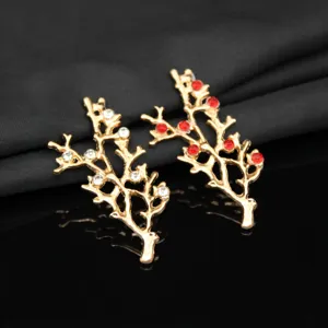 Detail shot of golden alloy branch DIY jewelry accessories with sparkling rhinestones.