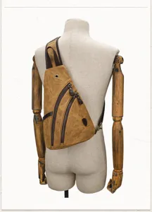 Retro canvas chest bag for men, casual sling backpack detail view showing quality material.
