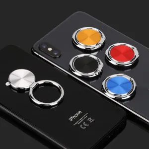 Close-up detail shot of ultra-thin metal phone ring holders showing CD texture and colors.