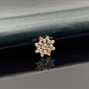 Rhinestone flower alloy DIY accessory detail shot, sparkling crystal decor for phone case.