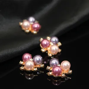 Close-up detail of multi-color pearl alloy DIY hair accessory with sparkling rhinestones.