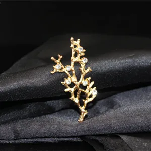 Detailed close-up view of gold alloy branch DIY jewelry accessory with sparkling crystal stones.