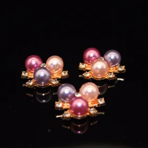 Detailed close-up view of handmade alloy pearl hair accessories, ideal for DIY decor.