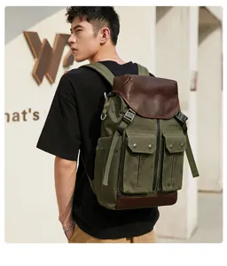 Vintage canvas backpack for men, large capacity travel laptop bag with brown leather flap details.