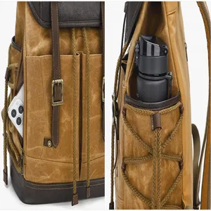 Vintage waxed canvas backpack detail, side pocket holding phone and water bottle, durable.