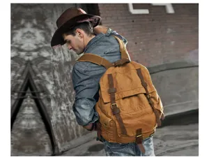 Vintage canvas backpack for men, casual large capacity travel rucksack with leather.