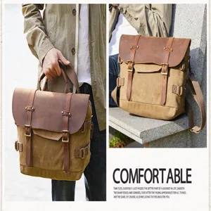 Vintage canvas messenger bag detail shot, showing durable leather flap and sturdy brass buckles.