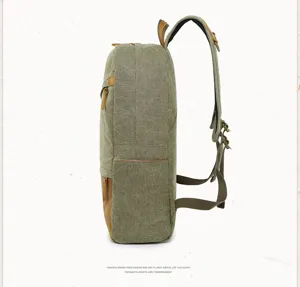 Men's casual canvas backpack with leather details, side view showing durable build and straps.