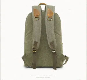 Vintage canvas backpack for men casual school daypack with durable leather straps and metal rings.