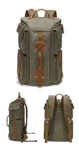Durable canvas backpack for men, large capacity outdoor travel laptop rucksack with multi pockets.