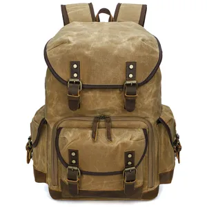 Zaino fotografico vintage in tela con finiture in pelle, elegante borsa per fotocamera reflex uomo.