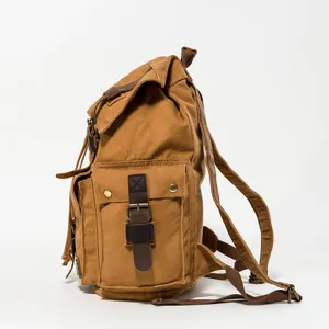 Vintage brown canvas backpack for men and women, durable casual travel school book bag.