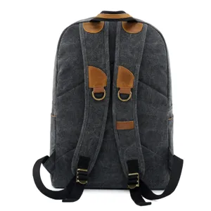 Classic men canvas backpack casual school rucksack with brown leather details and sturdy straps.