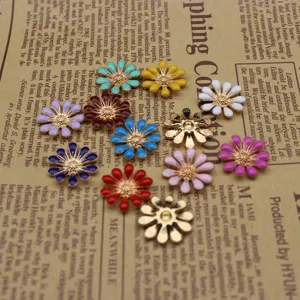 Close-up of colorful enamel daisy flower alloy charms for DIY phone case hair accessories