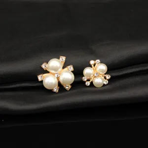 Close-up detail of alloy three pearl flower DIY craft accessories, elegant decorative components.