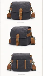 Dettaglio della borsa fotografica in tela con fibbia in ottone e tessuto resistente.
