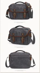 Vintage canvas DSLR camera bag shoulder messenger bag with leather trim and brass buckles.