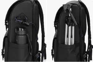 Detail view of waterproof camera backpack side pocket showing water bottle and tripod storage capacity.