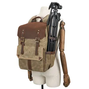 Vintage canvas DSLR camera backpack with tripod holder, waterproof casual travel bag.