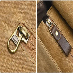 Close-up detail of durable canvas camera bag hardware, featuring smooth metallic zipper and pull tab.
