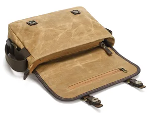Canvas camera insert bag detail showing the spacious main compartment and sturdy zipper closure.