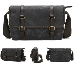 Canvas DSLR camera bag detail, vintage shoulder messenger bag with leather accents and metal buckles.