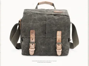 Gedetailleerd overzicht van de vintage canvas DSLR camera schoudertas met handvat.