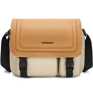 Sac bandoulière professionnel pour appareil photo reflex avec sangle et poches.