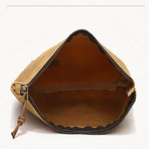 Retro waxed canvas men's clutch bag, lightweight storage pouch with zipper closure.