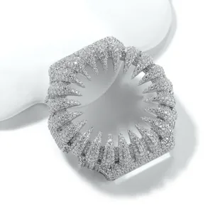Detailed close-up of the sparkling zircon-paved spike watch bezel showing intricate craftsmanship.