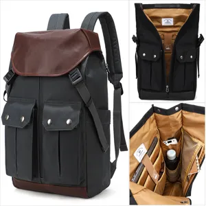 Vintage men's canvas and leather backpack, large capacity waterproof travel computer bag.