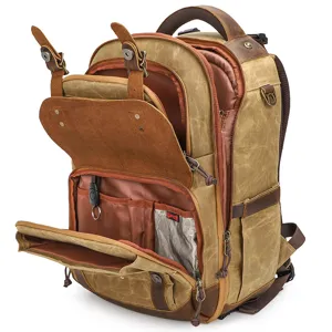 Vintage canvas DSLR camera backpack, multi-compartment travel photography rucksack.