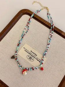 Collana di perle a doppio strato dopamina estiva con simpatici ciondoli a fungo.