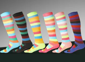 Colorful striped compression knee high socks for running marathon sports recovery.