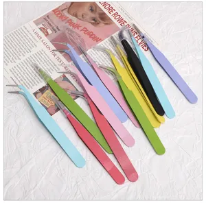 Colorful precision craft tweezers set, fine bent tip metal tools for DIY nail art projects.