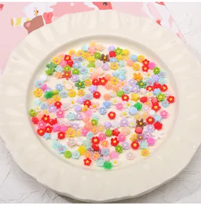 Perles de fleurs en résine mélangées sans trou pour bijoux DIY et accessoires d'artisanat.