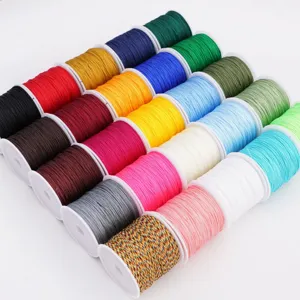 Colorful nylon jade cord spools set for DIY handmade jewelry weaving and bracelet making.