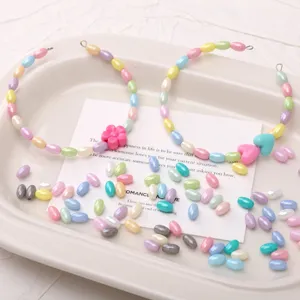 Glass seed beads DIY bracelet jewelry making kit with various pastel colored beads.