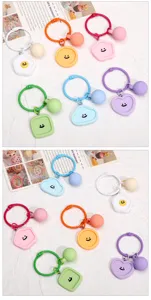Porte-clés géométrique en résine couleur bonbon visage souriant charmant pendentif DIY.