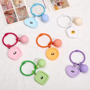 Porte-clés visage souriant en résine colorée mignons macaron géométrique pendentifs sac.