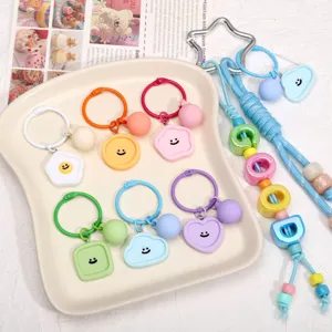 Porte-clés géométrique souriant en résine colorée mignon pendentif macaron pour accessoires DIY